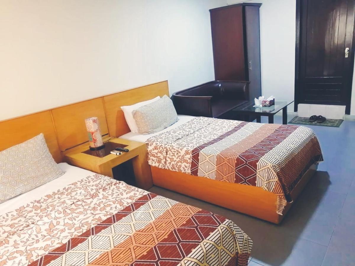 Hotel Rooms Dha Карачи Номер фото