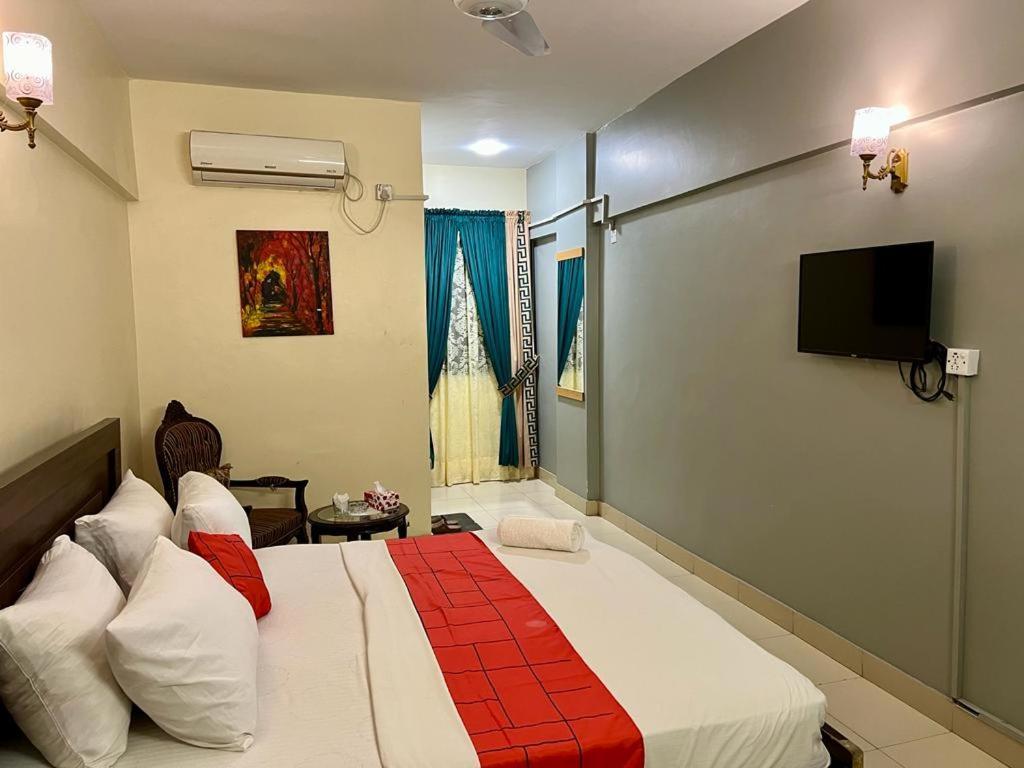 Hotel Rooms Dha Карачи Экстерьер фото