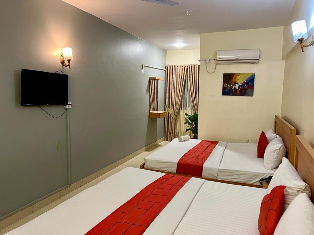 Hotel Rooms Dha Карачи Экстерьер фото