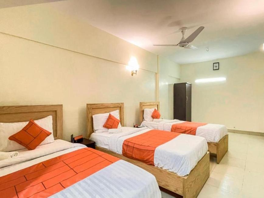Hotel Rooms Dha Карачи Экстерьер фото