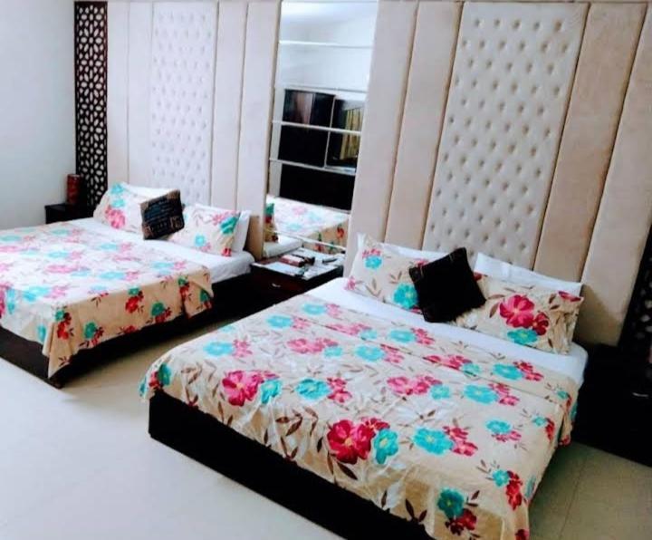 Hotel Rooms Dha Карачи Номер фото