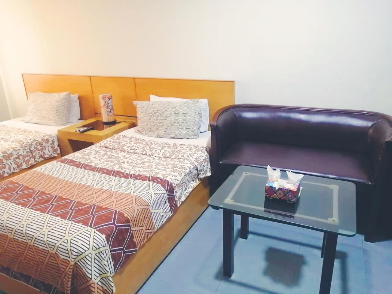 Hotel Rooms Dha Карачи Номер фото