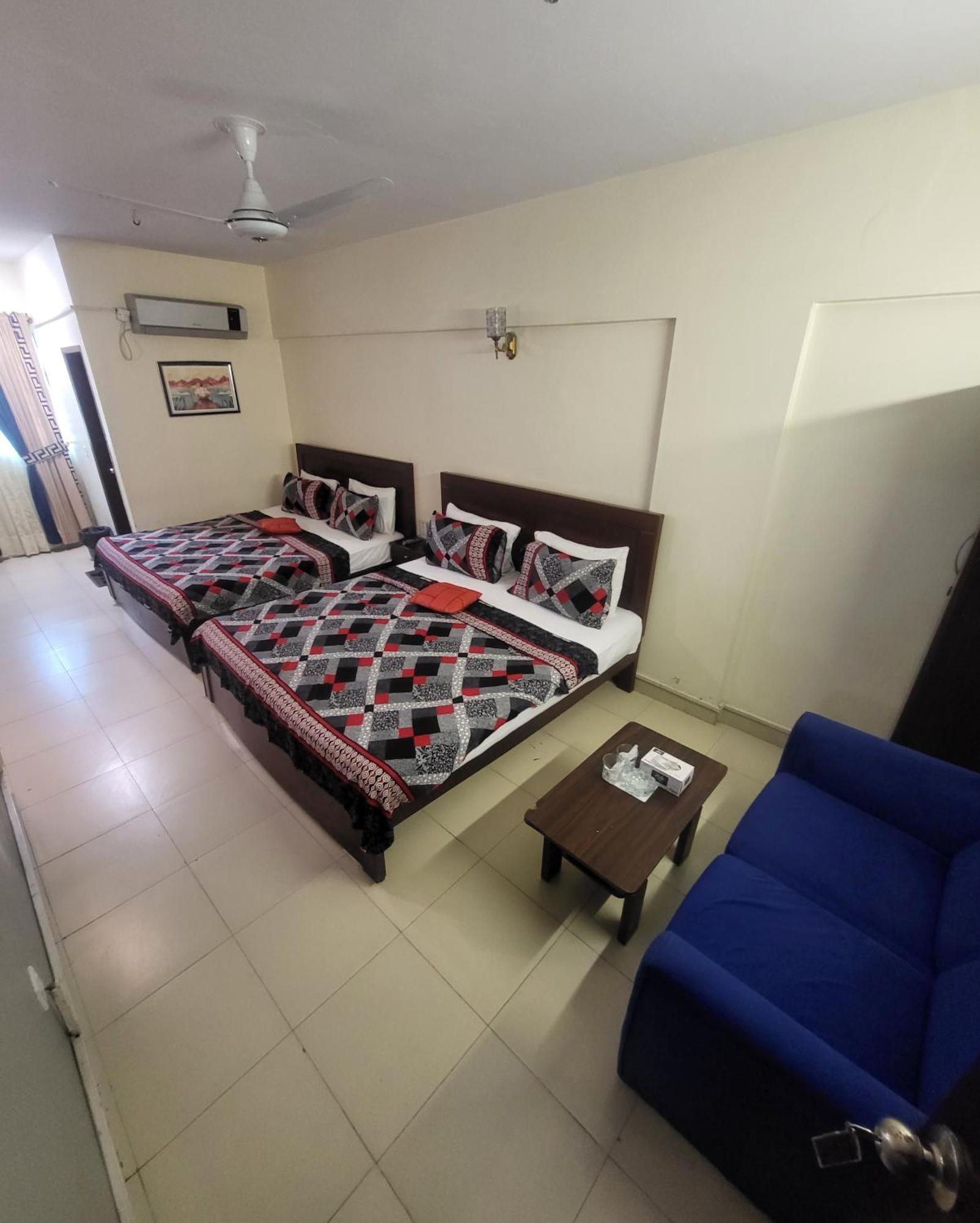 Hotel Rooms Dha Карачи Экстерьер фото