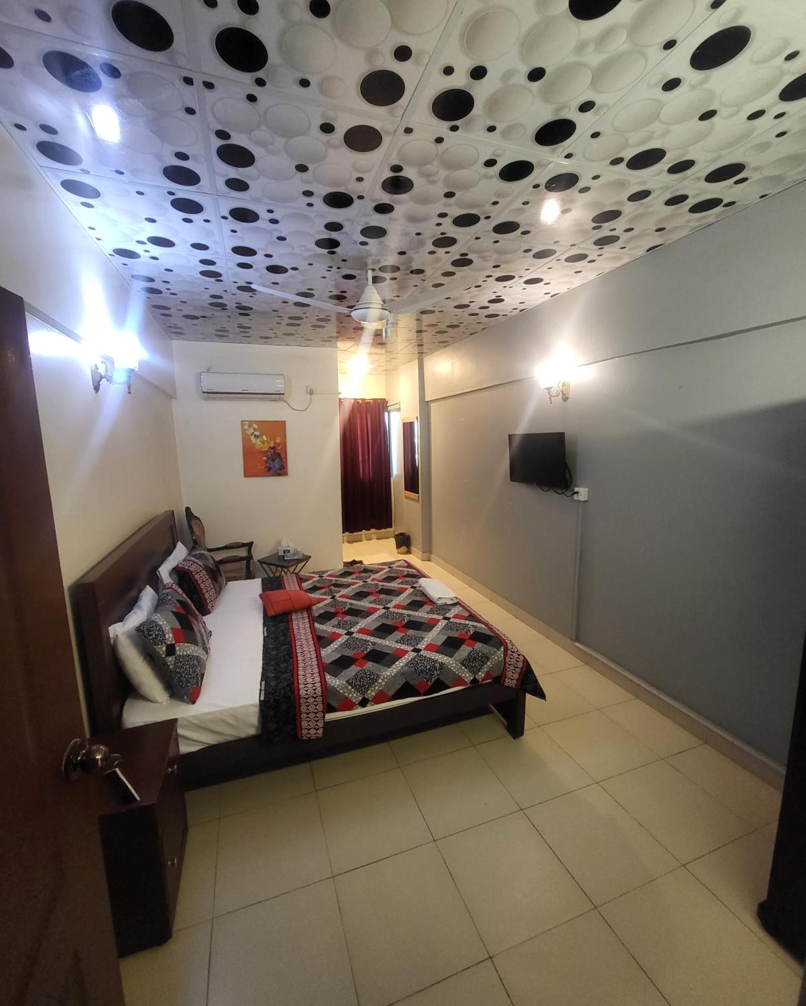 Hotel Rooms Dha Карачи Экстерьер фото