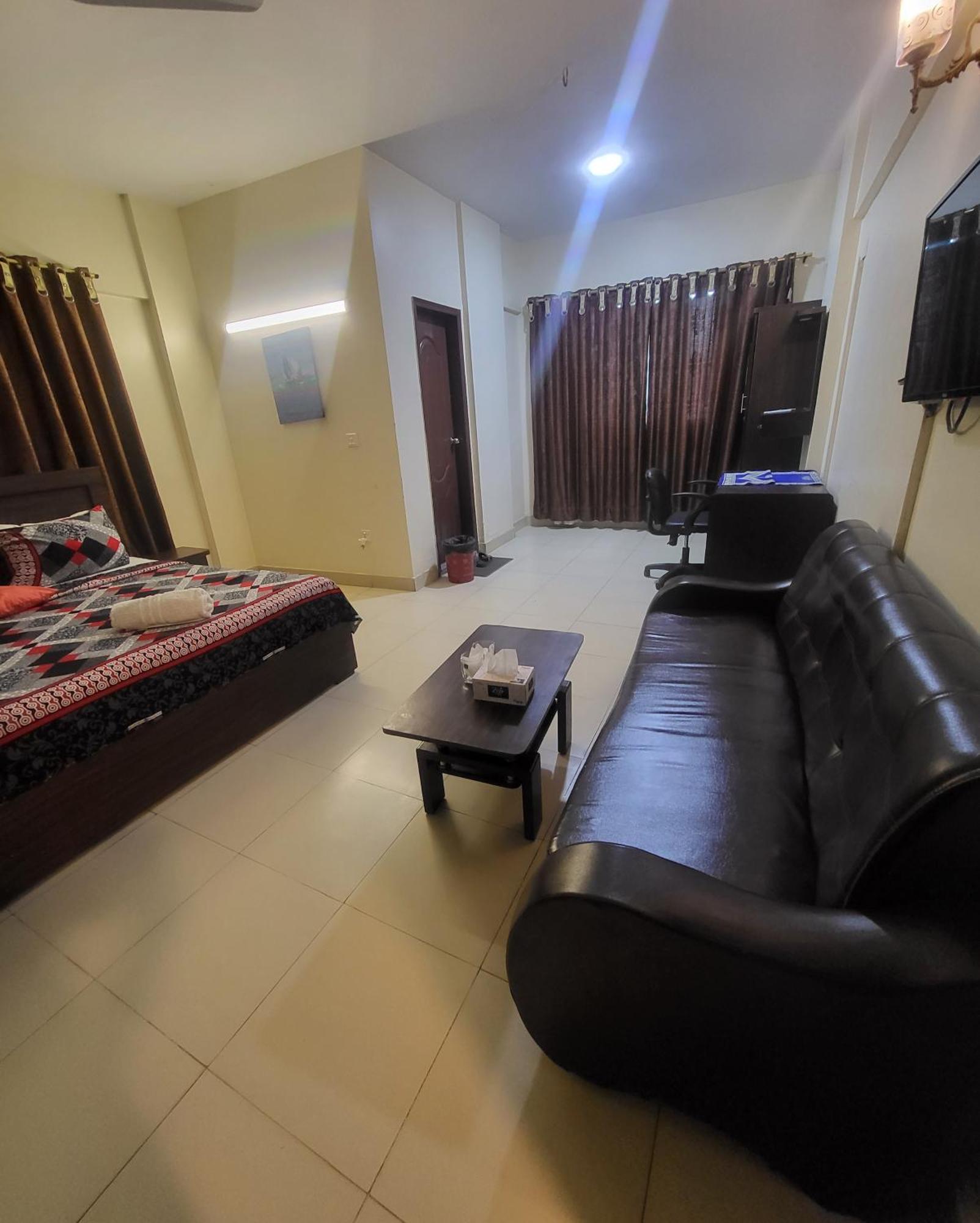 Hotel Rooms Dha Карачи Экстерьер фото